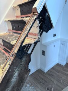 Fire damage to staircase close up image