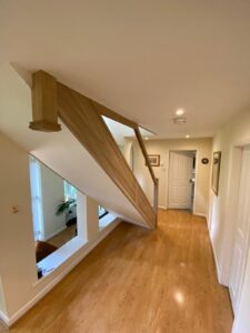 A new modern wooden and glass staircase in a Hampshire home